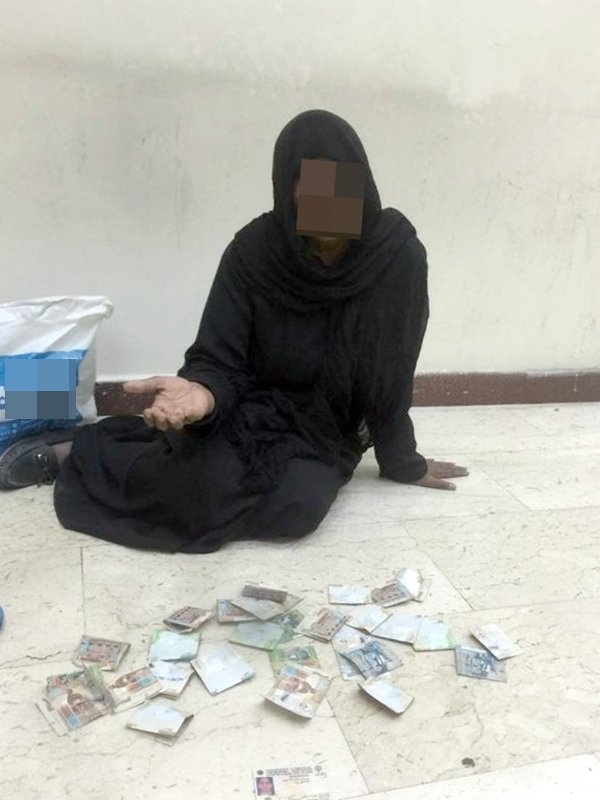 متسولة آسيوية في طريقها للإبعاد