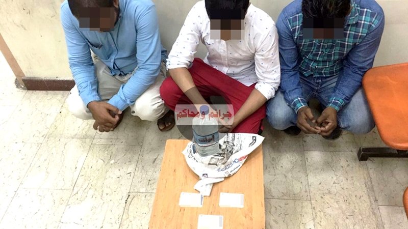 .. وثلاثة آسيويين بحوزتهم عبوة خمر